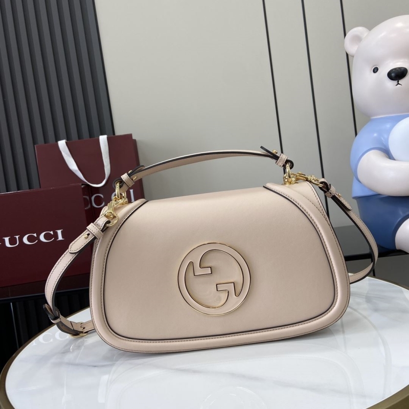 G*u*i top handle bags